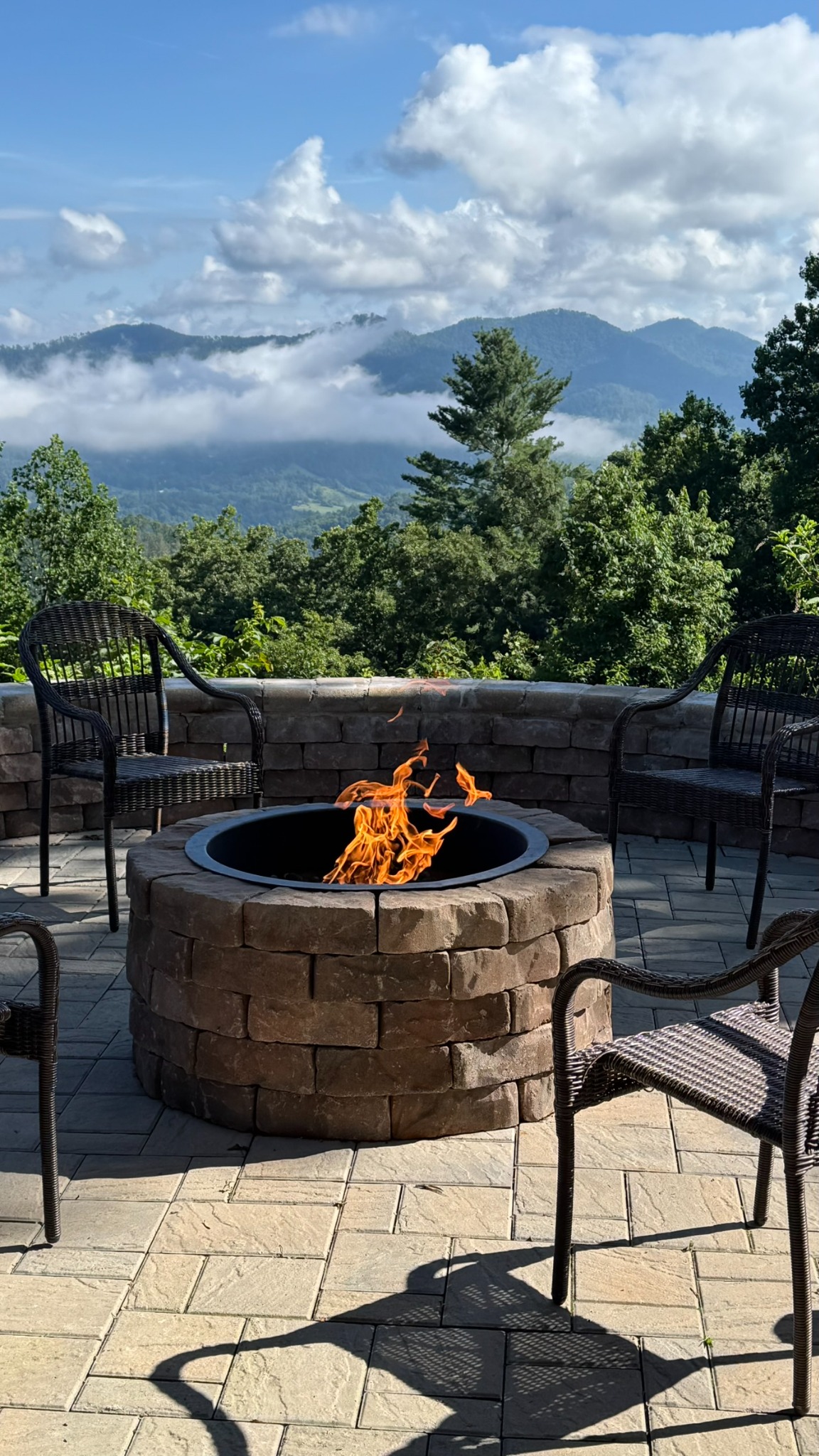 Clouds over the ridgeline · Watch clouds drift across the mountains from a seat beside the patio fire pit.
