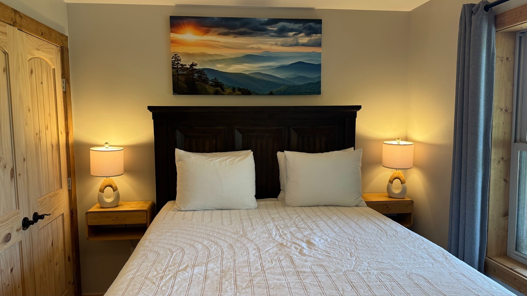 Bedroom 3 · Bed and mountain artwork