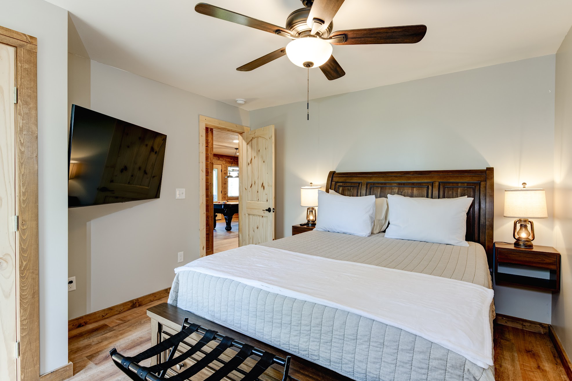 Bedroom 4 · Bed, television, and ceiling fan