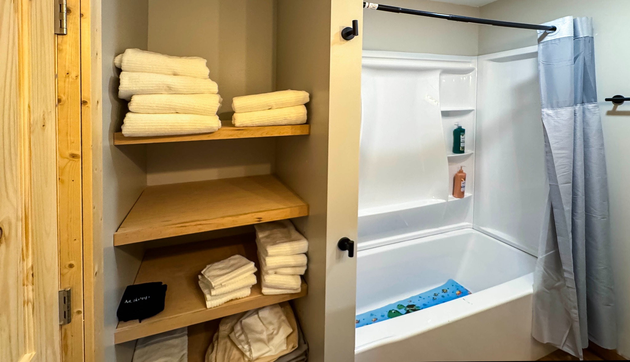 Downstairs suite bathroom · Tub and shower combination