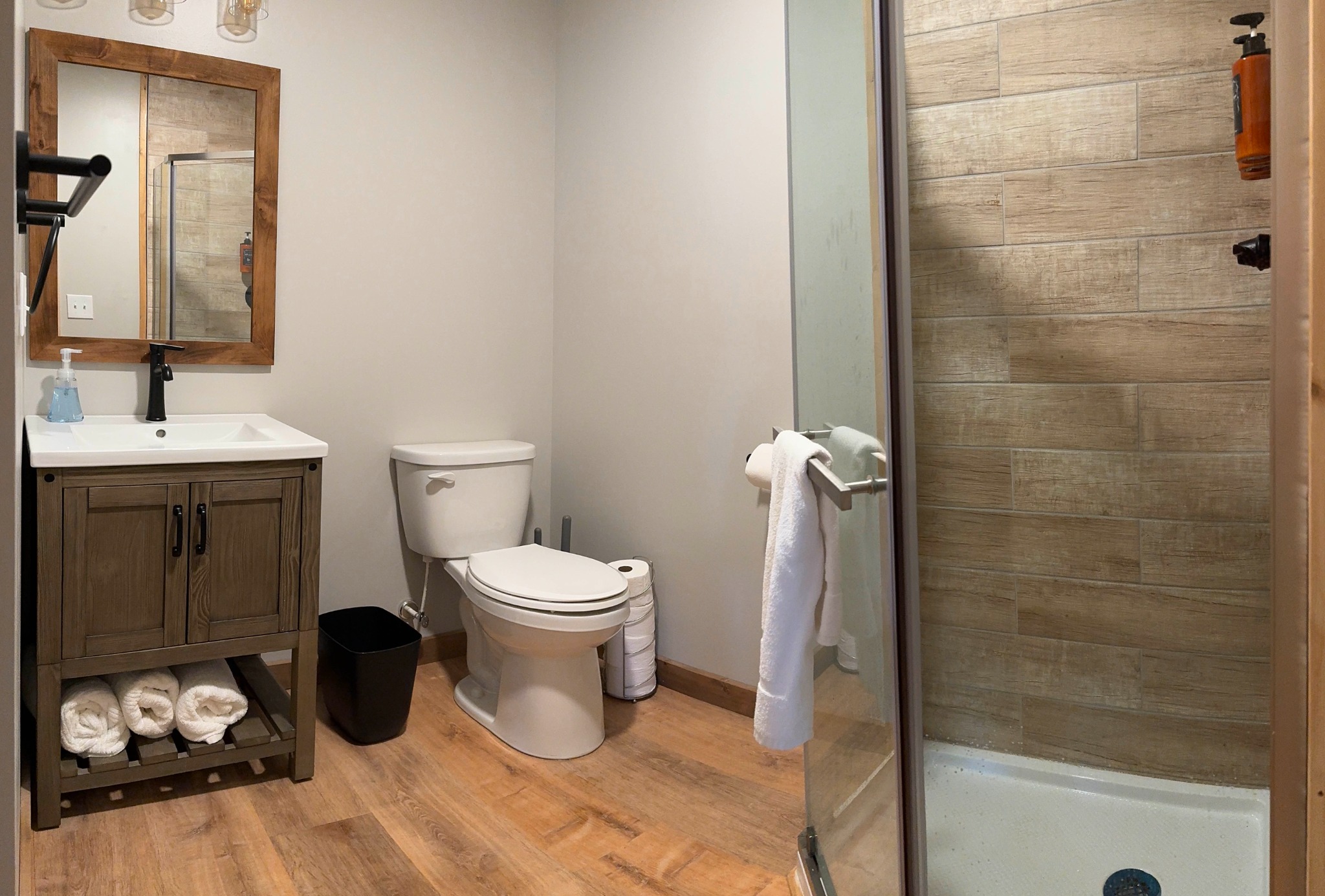 Shared downstairs bathroom · Vanity and shower